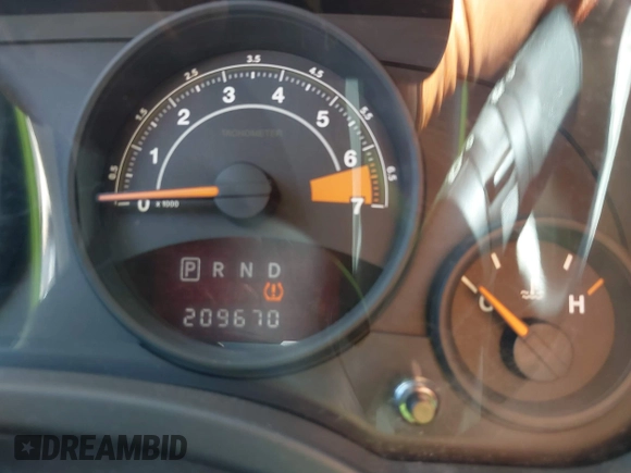 2014 Jeep Compass Sport with VIN 1C4NJCBB0ED660610, listed as a IAAI auction lot 40506737 with 209,670 mi miles. Bid and sale history available at carsss.com. Image 7.