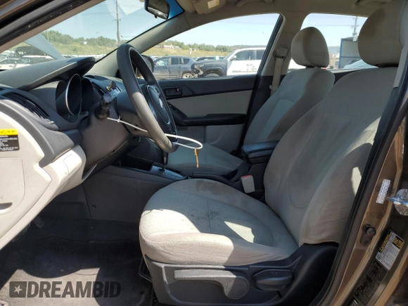 2010 Kia Forte EX with VIN KNAFU4A22A5880772, listed as a Copart auction lot 71679444 with 150,734 mi miles and Salvage Title. Bid and sale history available at carsss.com. Image 7.