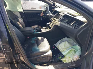 2014 Ford Taurus SEL with VIN 1FAHP2E8XEG133992, listed as a IAAI auction lot 42223678 with 201,204 mi miles and . Bid and sale history available at carsss.com. Image 5.