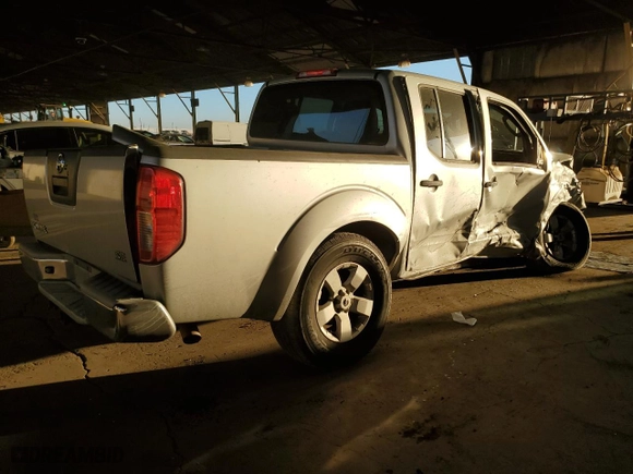 2009 Nissan Frontier SE with VIN 1N6AD07U49C405644, listed as a Copart auction lot 44342525 with 212,826 mi miles and Salvage Title. Bid and sale history available at carsss.com. Image 3.