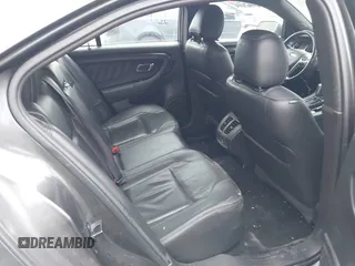 2015 Ford Taurus Limited with VIN 1FAHP2J88FG153326, listed as a IAAI auction lot 41465344 with 98,727 mi miles. Bid and sale history available at carsss.com. Image 8.
