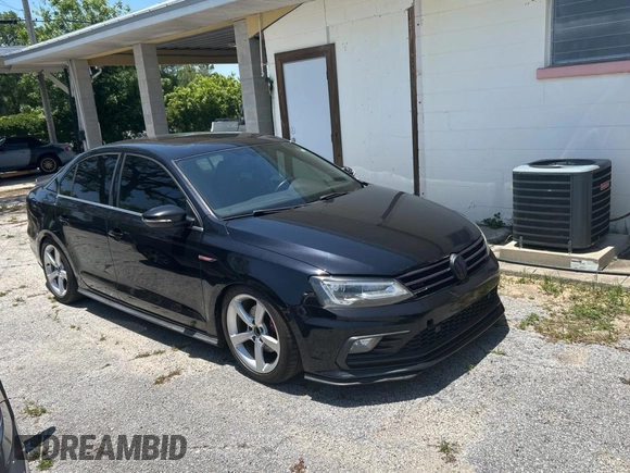 2017 Volkswagen Jetta GLI z VIN 3VW5T7AJ9HM330125, wystawiony jako Copart lot #57632155 z przebiegiem 103 949 mil mil oraz Czysty tytuł • Clean title. Historia ofert i sprzedaży dostępna na DreamBid. Obrazek 1.