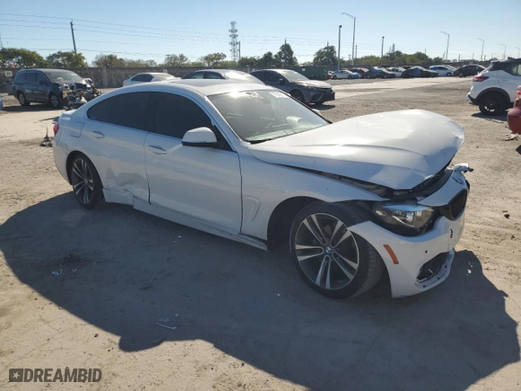 2020 BMW 4 Series 430i with VIN WBA4J1C01LCE54230, listed as a Copart auction lot 87542215 with 57,473 mi miles and Non Repairable. Bid and sale history available at carsss.com. Image 4.