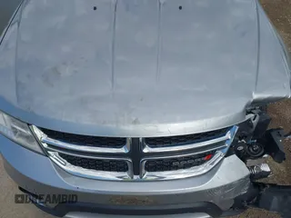 2017 Dodge Journey SXT z VIN 3C4PDDBG6HT595309, wystawiony jako IAAI lot #41918029 z przebiegiem 127 247 mil mil oraz . Historia ofert i sprzedaży dostępna na DreamBid. Obrazek 17.