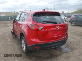 2014 Mazda CX-5 Touring z VIN JM3KE2CY3E0424892, wystawiony jako IAAI lot #42016801 z przebiegiem 173 350 mil mil oraz . Historia ofert i sprzedaży dostępna na DreamBid. Obrazek 16.