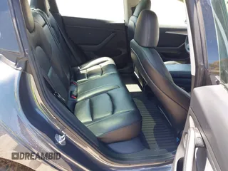 2023 Tesla Model 3 z VIN 5YJ3E1EA0PF655244, wystawiony jako IAAI lot #42004592 z przebiegiem 54 860 mil mil oraz . Historia ofert i sprzedaży dostępna na DreamBid. Obrazek 8.