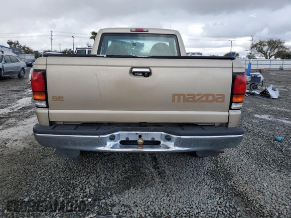 1999 Mazda B-Series Truck SX z VIN 4F4YR12C4XTM21614, wystawiony jako Copart lot #49276195 z przebiegiem 155 420 mil mil oraz Czysty tytuł • Clean title. Historia ofert i sprzedaży dostępna na DreamBid. Obrazek 6.