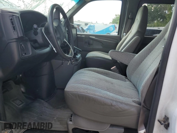 2003 Chevrolet Express Passenger with VIN 1GAHG39UX31231081, listed as a Copart auction lot 62132445 with 207,650 mi miles and Salvage title. Bid and sale history available at DreamBid. Image 7.