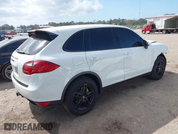 2014 Porsche Cayenne S z VIN WP1AB2A2XELA58986, wystawiony jako IAAI lot #41577501 z przebiegiem 53 672 mil mil oraz . Historia ofert i sprzedaży dostępna na DreamBid. Obrazek 4.
