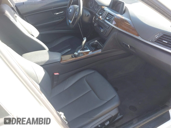 2015 BMW 3 Series 328i with VIN WBA3C1C52FK119339, listed as a IAAI auction lot 41549876 with 148,347 mi miles and . Bid and sale history available at carsss.com. Image 5.