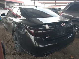 2019 Infiniti Q50 Luxe with VIN JN1EV7ARXKM593846, listed as a IAAI auction lot 42773548 with 57,165 mi miles and . Bid and sale history available at DreamBid. Image 3.