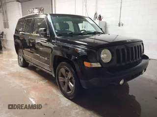 2014 Jeep Patriot High Altitude with VIN 1C4NJPFAXED679271, listed as a IAAI auction lot 41290600 with 157,256 mi miles and . Bid and sale history available at carsss.com. Image 1.