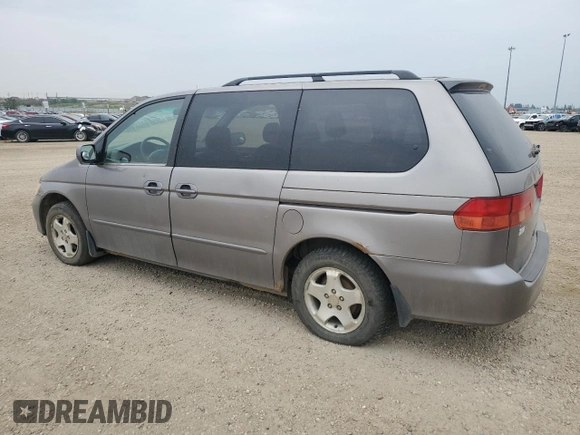 2000 Honda Odyssey EX z VIN 2HKRL186XYH010384, wystawiony jako Copart lot #60871845 z przebiegiem 423 167 mil mil oraz Czysty tytuł • Clean title. Historia ofert i sprzedaży dostępna na DreamBid. Obrazek 2.