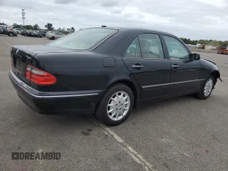 2001 Mercedes-Benz E-Class AWD with VIN WDBJF82J91X060969, listed as a Copart auction lot 71986544 with 113,694 mi miles and Salvage Title. Bid and sale history available at carsss.com. Image 3.