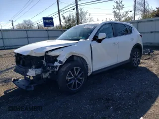 2018 Mazda CX-5 Touring with VIN JM3KFBCM3J0437422, listed as a Copart auction lot 49909575 with 0 mi miles and Salvage Title. Bid and sale history available at carsss.com. Image 1.
