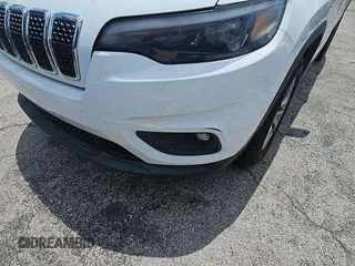 2019 Jeep Cherokee Altitude with VIN 1C4PJMLX6KD361465, listed as a IAAI auction lot 42730449 with 116,730 mi miles and . Bid and sale history available at DreamBid. Image 12.