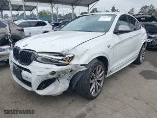 2017 BMW X4 M40i with VIN 5UXXW7C59H0M91384, listed as a IAAI auction lot 41883585 with 163,547 mi miles. Bid and sale history available at carsss.com. Image 2.