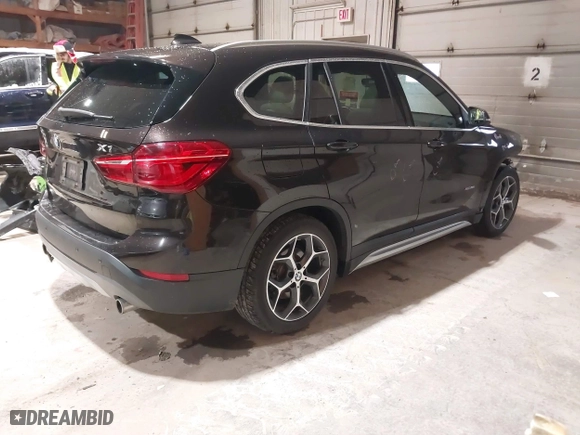2016 BMW X1 xDrive28i with VIN WBXHT3C33GP886935, listed as a IAAI auction lot 41707367 with 73,201 mi miles. Bid and sale history available at carsss.com. Image 4.