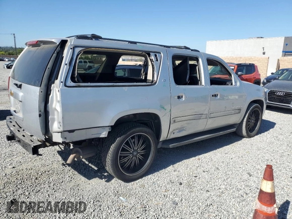 2013 Chevrolet Suburban LT with VIN 1GNSCJE05DR371789, listed as a Copart auction lot 60755775 with 233,275 mi miles and Salvage title. Bid and sale history available at DreamBid. Image 3.
