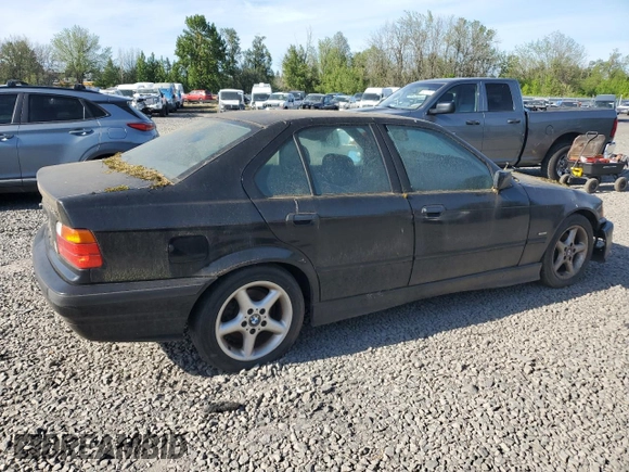 1998 BMW 3 Series 328iA with VIN WBACD4329WAV61738, listed as a Copart auction lot 68561744 with 0 mi miles and Salvage Title. Bid and sale history available at carsss.com. Image 3.