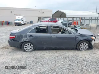 2009 Toyota Camry LE z VIN 4T1BK46KX9U594987, wystawiony jako IAAI lot #42039029 z przebiegiem 156 812 mil mil oraz . Historia ofert i sprzedaży dostępna na DreamBid. Obrazek 14.