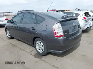 2006 Toyota Prius with VIN JTDKB20U263198282, listed as a IAAI auction lot 42019145 with 96,933 mi miles. Bid and sale history available at carsss.com. Image 3.