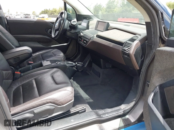 2017 BMW i3 z VIN WBY1Z8C5XHV889564, wystawiony jako IAAI lot #42239516 z przebiegiem 54 400 mil mil oraz . Historia ofert i sprzedaży dostępna na DreamBid. Obrazek 5.