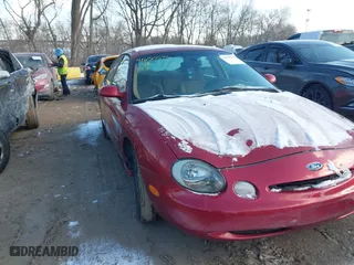 1997 Ford Taurus LX with VIN 1FALP53S0VG308339, listed as a IAAI auction lot 41630596 with 171,871 mi miles. Bid and sale history available at carsss.com. Image 1.