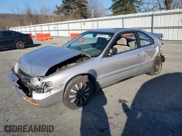 1997 Honda Accord LX with VIN 1HGCD723XVA033754, listed as a Copart auction lot 85194774 with 77,269 mi miles and Salvage Title. Bid and sale history available at carsss.com. Image 1.