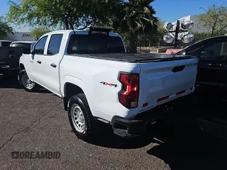 2023 Chevrolet Colorado 4WD Work Truck with VIN 1GCGTBEC2P1200144, listed as a IAAI auction lot 42667360 with 29,151 mi miles and . Bid and sale history available at DreamBid. Image 6.