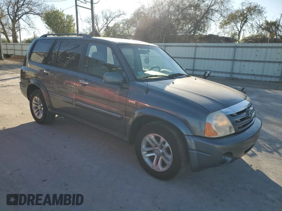 2005 Suzuki XL7 LX z VIN JS3TY92V554107839, wystawiony jako Copart lot #88328455 z przebiegiem 122 912 mil mil oraz Szkoda całkowita • Salvage title. Historia ofert i sprzedaży dostępna na DreamBid. Obrazek 4.