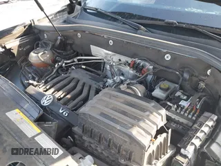 2021 Volkswagen Atlas SE z VIN 1V2RE2CA8MC201494, wystawiony jako IAAI lot #41498075 z przebiegiem 67 687 mil mil oraz . Historia ofert i sprzedaży dostępna na DreamBid. Obrazek 10.
