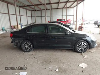 2012 Volkswagen Jetta Sedan SEL w/Sunroof with VIN 3VWLX7AJ5CM379634, listed as a IAAI auction lot 41634048 with 209,586 mi miles. Bid and sale history available at carsss.com. Image 14.