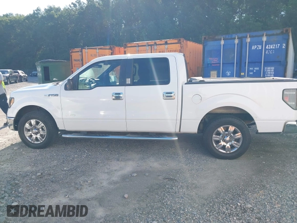 2011 Ford F-150 XLT with VIN 1FTFW1CT4BFD03061, listed as a IAAI auction lot 42633221 with 307,414 mi miles and . Bid and sale history available at DreamBid. Image 14.