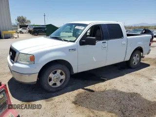 2006 Ford F-150 XLT with VIN 1FTRW12W16KB23901, listed as a Copart auction lot 61093795 with 164,084 mi miles and Salvage title. Bid and sale history available at DreamBid. Image 1.