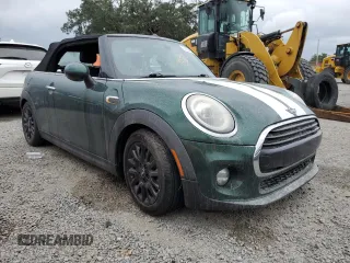 2019 MINI Convertible Cooper with VIN WMWWG5C55K3F79689, listed as a Copart auction lot 74001384 with 0 mi miles and Salvage Title. Bid and sale history available at carsss.com. Image 4.