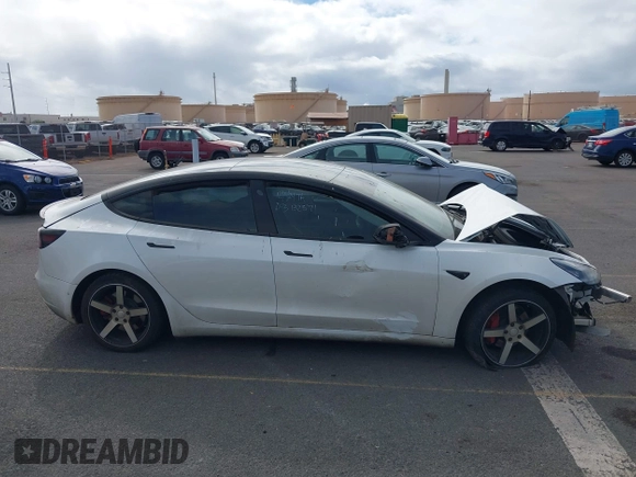 2019 Tesla Model 3 Mid Range with VIN 5YJ3E1EA6KF396946, listed as a IAAI auction lot 41123058 with 69,013 mi miles and . Bid and sale history available at carsss.com. Image 14.