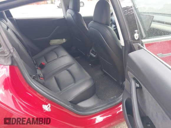 2018 Tesla Model 3 Long Range Battery z VIN 5YJ3E1EA9JF025942, wystawiony jako IAAI lot #42122703 z przebiegiem 84 453 mil mil oraz . Historia ofert i sprzedaży dostępna na DreamBid. Obrazek 8.