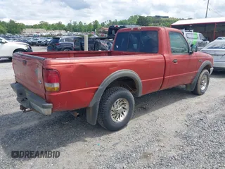 1999 Ford Ranger with VIN 1FTZR11XXXPB07153, listed as a IAAI auction lot 42189106 with 239,606 mi miles and . Bid and sale history available at DreamBid. Image 4.