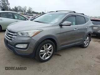 2015 Hyundai Santa Fe z VIN 5XYZW4LA9FG283826, wystawiony jako IAAI lot #42289253 z przebiegiem 120 369 mil mil oraz . Historia ofert i sprzedaży dostępna na DreamBid. Obrazek 2.
