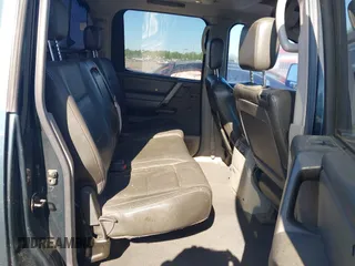 2004 Nissan Titan LE with VIN 1N6AA07B74N547779, listed as a IAAI auction lot 41977881 with 157,348 mi miles and . Bid and sale history available at carsss.com. Image 8.