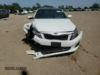2014 Kia Optima SX Turbo with VIN 5XXGR4A69EG292770, listed as a Copart auction lot 60703465 with 148,171 mi miles and Salvage title. Bid and sale history available at DreamBid. Image 13.