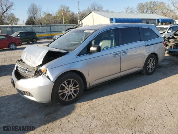 2012 Honda Odyssey EX-L with VIN 5FNRL5H6XCB008567, listed as a Copart auction lot 50635285 with 215,418 mi miles and Salvage Title. Bid and sale history available at carsss.com. Image 1.