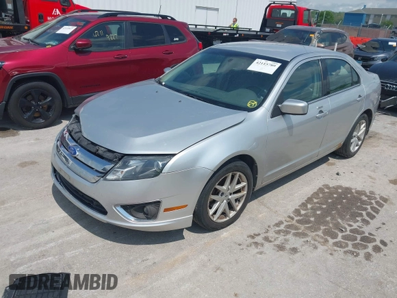 2012 Ford Fusion SEL with VIN 3FAHP0JA9CR200052, listed as a IAAI auction lot 42115789 with 141,963 mi miles and . Bid and sale history available at DreamBid. Image 2.