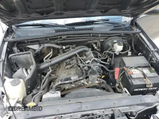 2013 Toyota Tacoma z VIN 5TFNX4CN2DX020635, wystawiony jako Copart lot #54427725 z przebiegiem 107 500 mil mil oraz Szkoda całkowita • Salvage title. Historia ofert i sprzedaży dostępna na DreamBid. Obrazek 11.