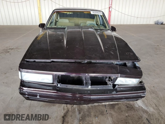 1987 Chevrolet Monte Carlo z VIN 1G1GZ11H6HR117922, wystawiony jako Copart lot #45329575 z przebiegiem 49 753 mil mil oraz Tytuł czysty. Historia ofert i sprzedaży dostępna na DreamBid. Obrazek 5.