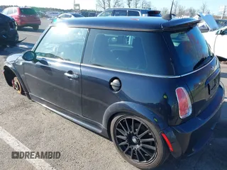 2006 MINI Hardtop S with VIN WMWRE33526TL24203, listed as a IAAI auction lot 41988451 with 88,746 mi miles and . Bid and sale history available at DreamBid. Image 3.