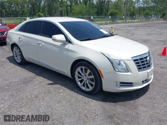 2013 Cadillac XTS Luxury with VIN 2G61P5S38D9160016, listed as a IAAI auction lot 42192602 with 134,879 mi miles and . Bid and sale history available at DreamBid. Image 1.