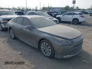 2021 Toyota Mirai XLE with VIN JTDAAAAA4MA000887, listed as a IAAI auction lot 41811773 with 19,467 mi miles and . Bid and sale history available at carsss.com. Image 1.
