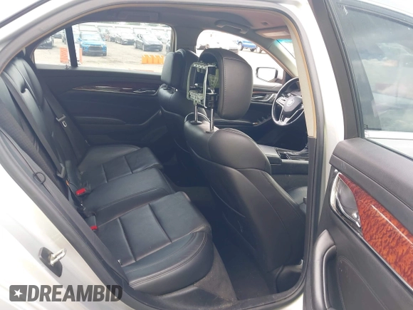 2014 Cadillac CTS Luxury RWD z VIN 1G6AR5S38E0173628, wystawiony jako IAAI lot #42343647 z przebiegiem 166 035 mil mil oraz . Historia ofert i sprzedaży dostępna na DreamBid. Obrazek 8.
